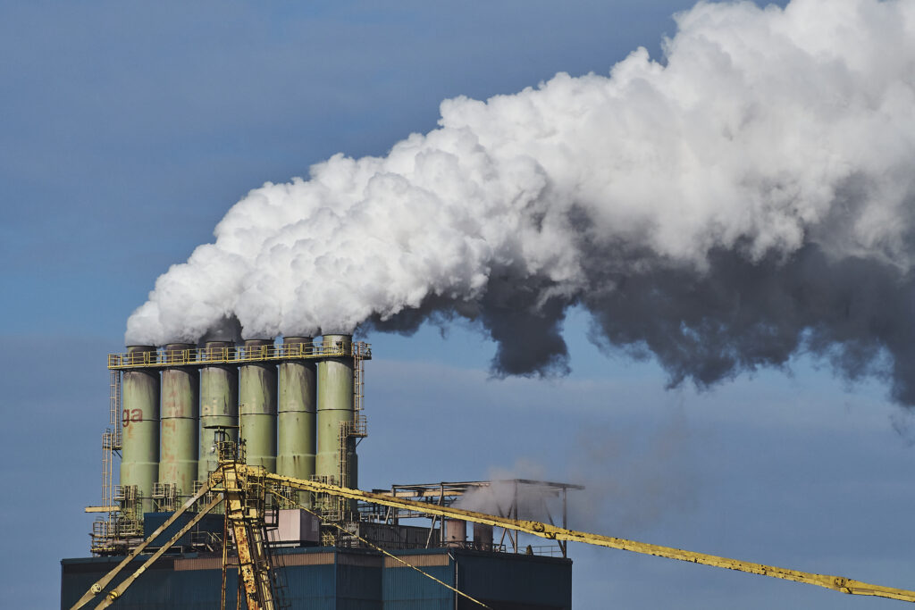 Smoke coming out of factories in an industrial area